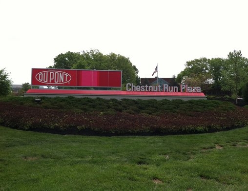 DuPont reports lower sales and profits