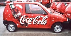 Folia Avery 800 na  samochodach promujących w Polsce Coca Colę