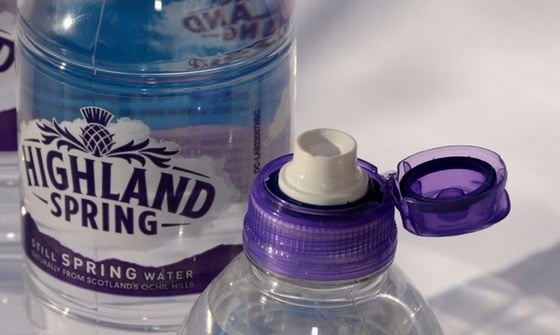 Closure helps to secure bottled water image
