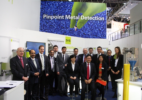 Metal separators and sorting systems for the plastics industry