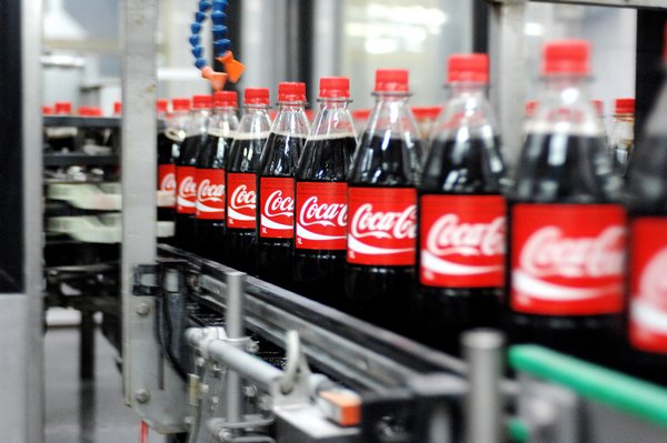 El-Exis SP produces caps for Coca-Cola