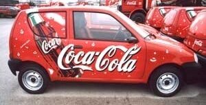 Folia Avery 800 na  samochodach promujących w Polsce Coca Colę