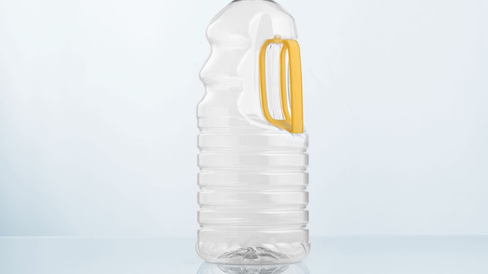 KHS now offers technology for the manufacture of large PET containers with integral handles