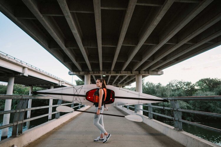 6a-oru-bay-st-kayak-woman-carrying