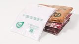 The first textile company to pack clothing in Woodly's carbon-neutral, wood-based plastic