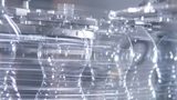 100,000 bottles per hour