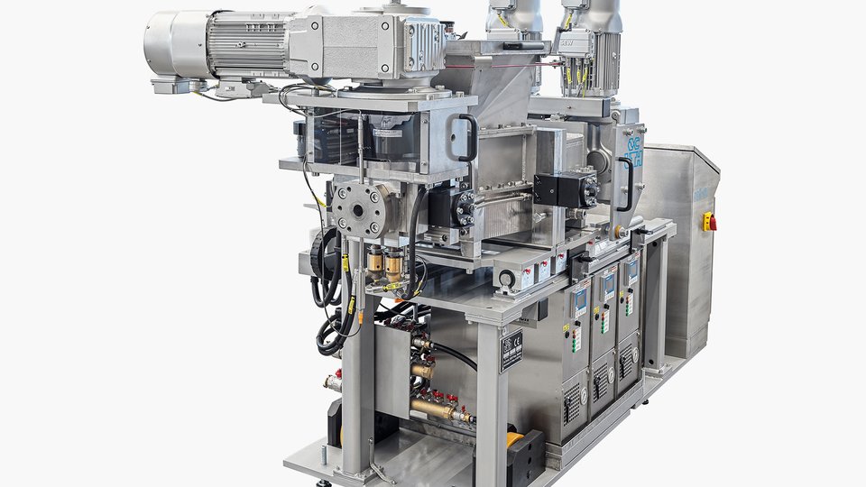 Continuous compounding processes for solid silicone rubber