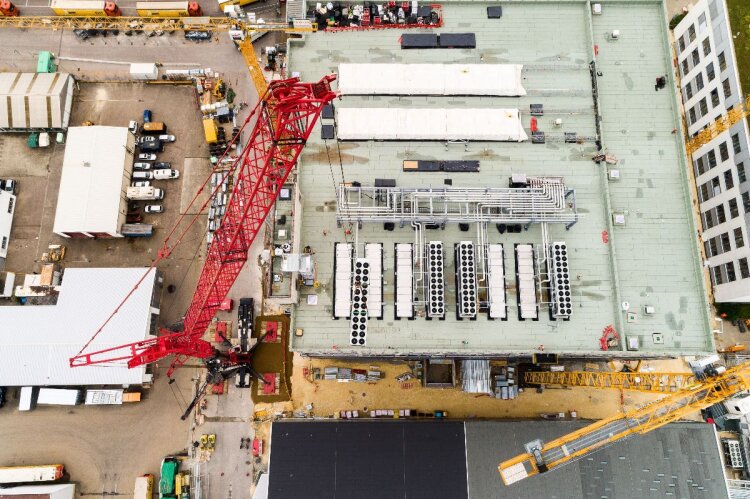 Installation of air coolers on the roof of a new biotech plant.