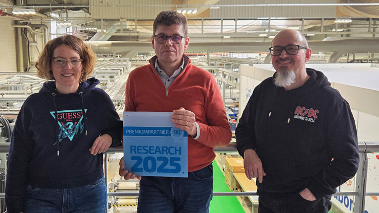 Celia Descheemaeker, R&D Engineer at Tarkett, Christophe Maertens, R&D Scientific Director at Tarkett, and Diego Gourdin, R&D Engineer, Master Expert PVC at Tarkett, at the award ceremony. (Photo: Tarkett)