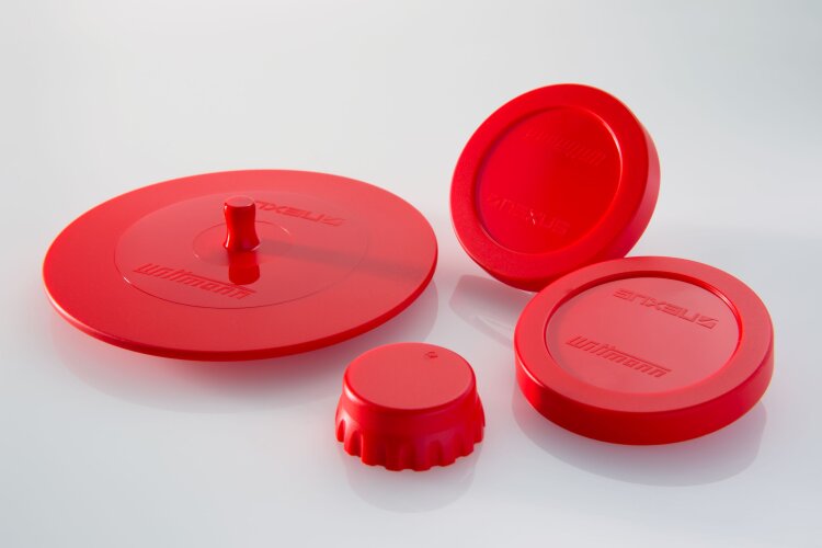 On an EcoPower injection molding machine in the LSR configuration, four different beverage lids made of liquid silicone are produced in each cycle using a 4-cavity family mold.